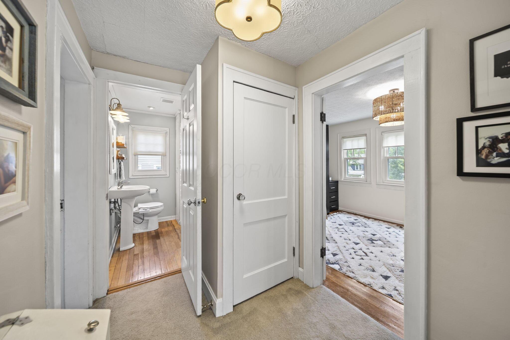 395 Brevoort Road Columbus, OH 43214 - Photo 27 of 64 Upstairs Landing Toward Full Bath and 2nd Bedroom