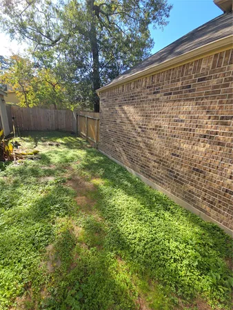 a view of a back yard of the house