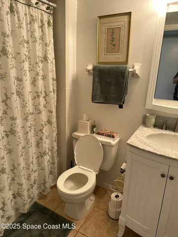 a bathroom with a toilet and a sink