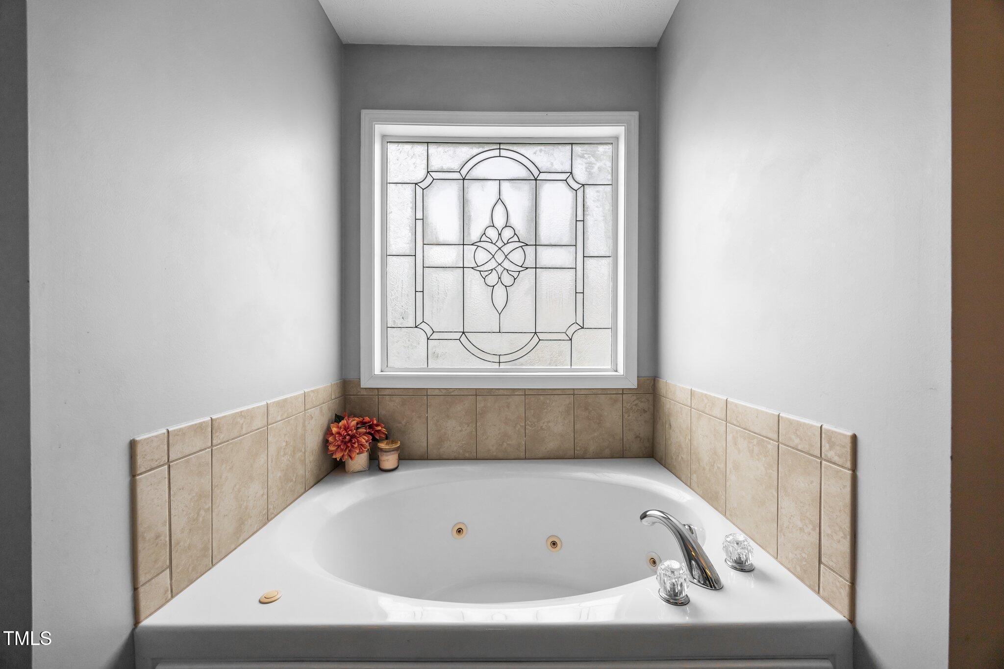 76 Haywood Street Spring Lake, NC 28390 - Photo 14 of 28 a bathroom with a bathtub