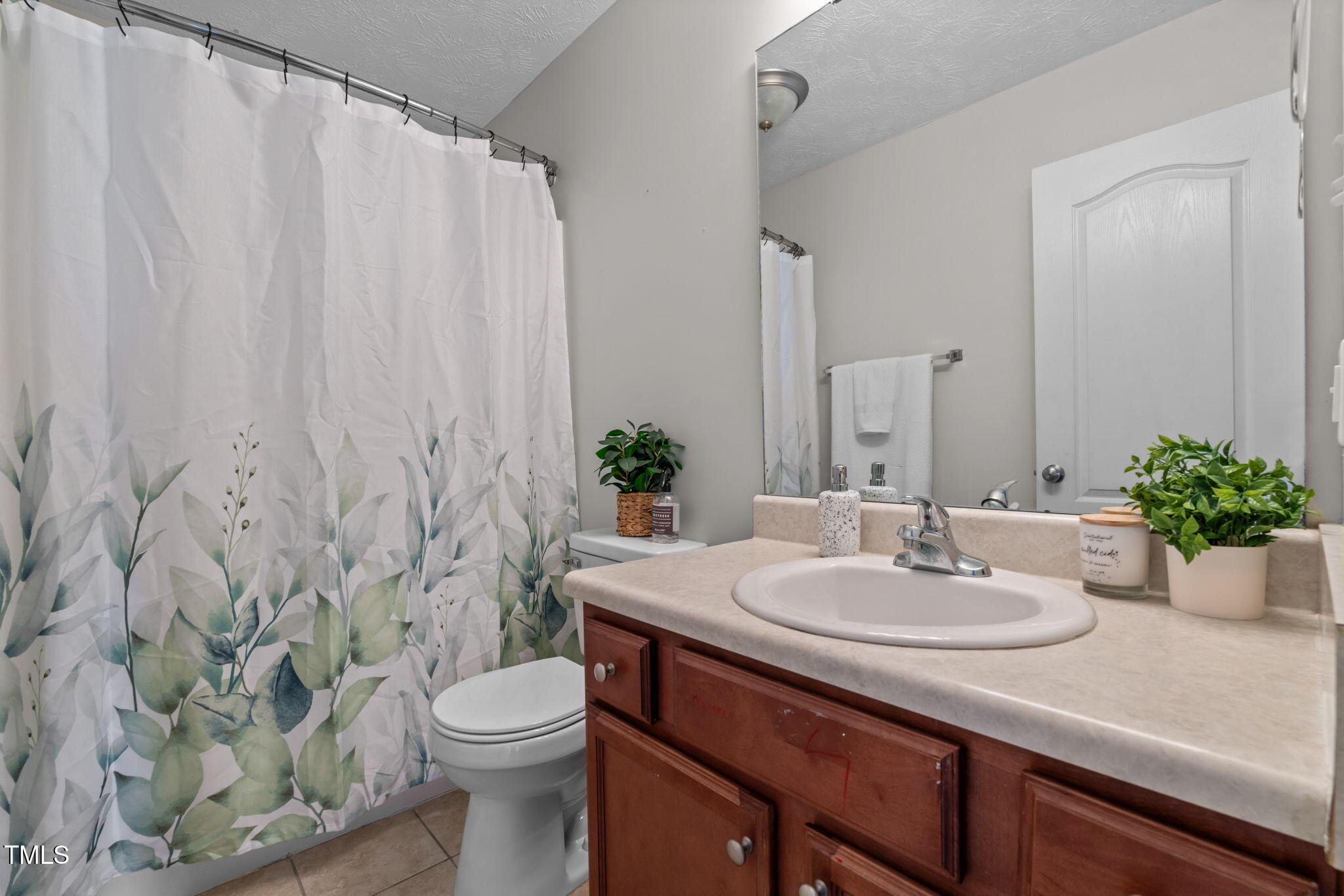 76 Haywood Street Spring Lake, NC 28390 - Photo 20 of 28 a bathroom with a sink toilet and shower