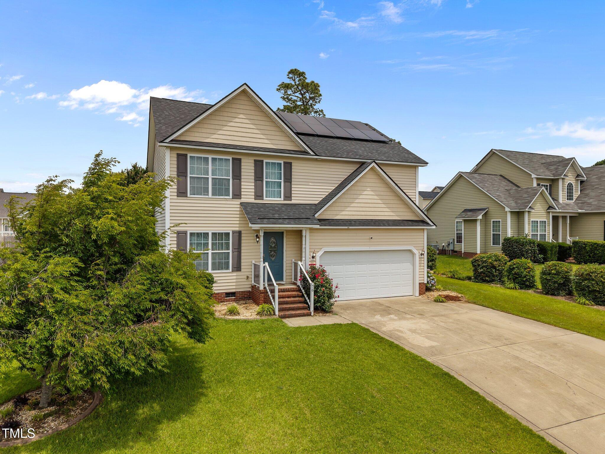 76 Haywood Street Spring Lake, NC 28390 - Photo 28 of 28 a house view with a garden space