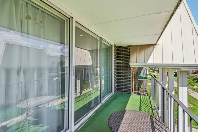 a view of a building with a yard