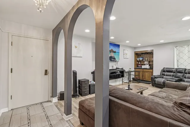 a living room with furniture and a table