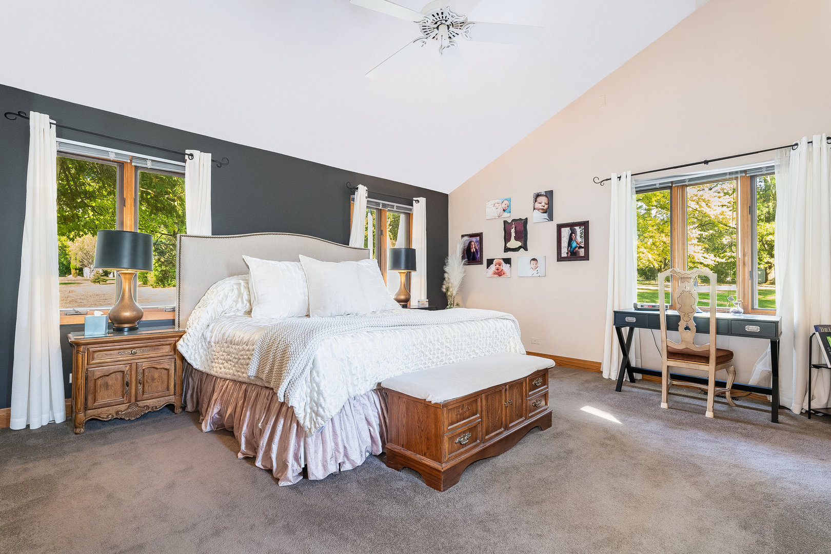 4S365 Meadow Road Naperville, IL 60563 - Photo 12 of 32 a spacious bedroom with a bed and a chandelier