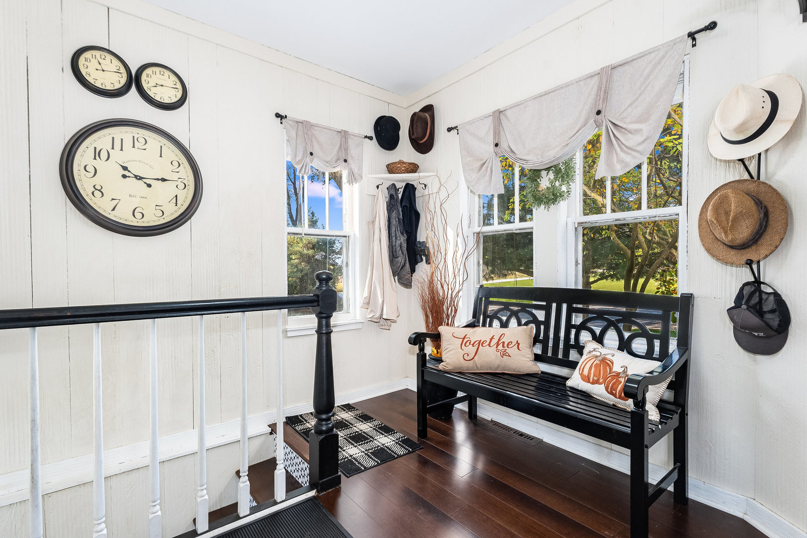 4S365 Meadow Road Naperville, IL 60563 - Photo 5 of 32 a living room with furniture and a clock