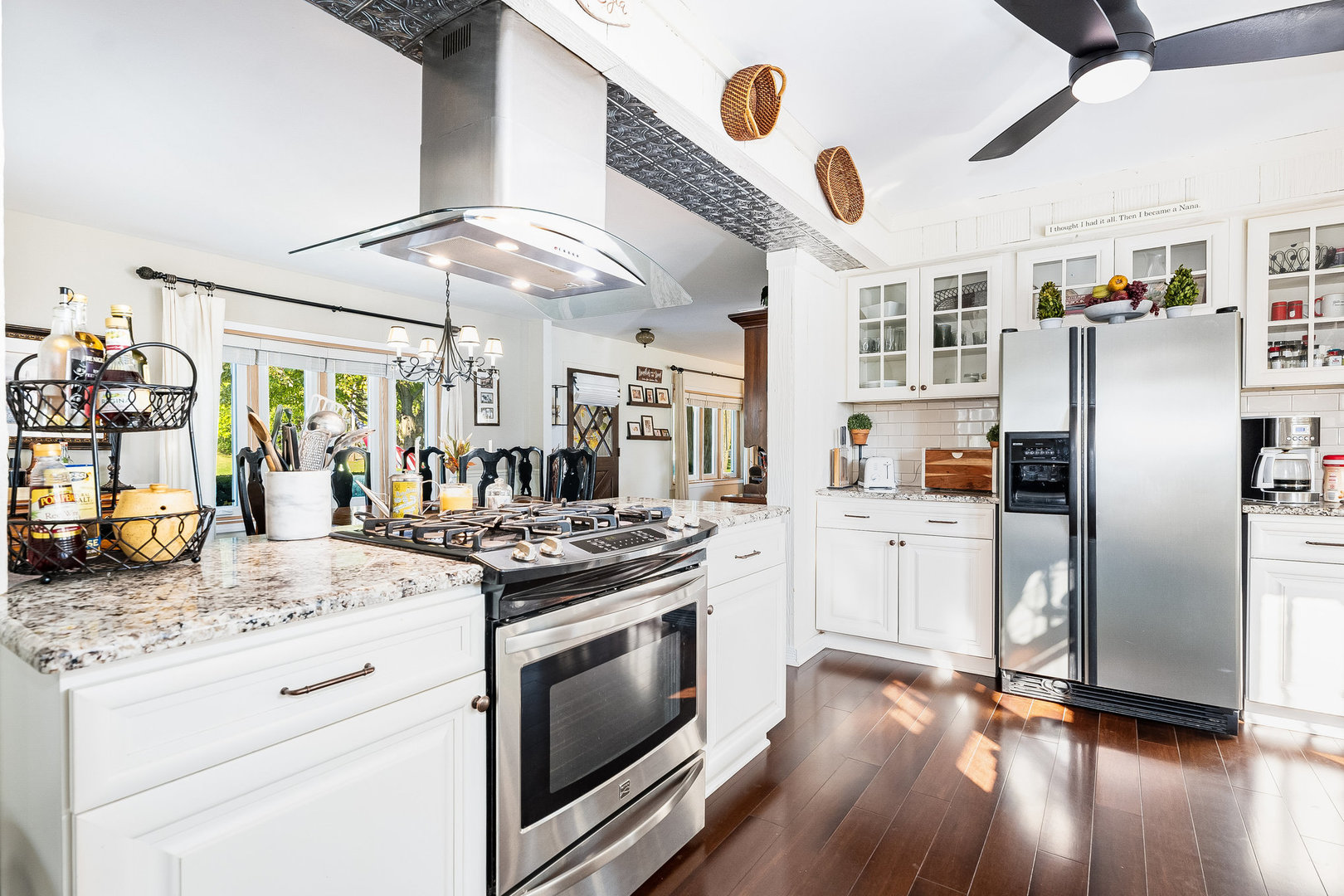 4S365 Meadow Road Naperville, IL 60563 - Photo 6 of 32 a kitchen with stainless steel appliances granite countertop a stove a refrigerator and a microwave oven