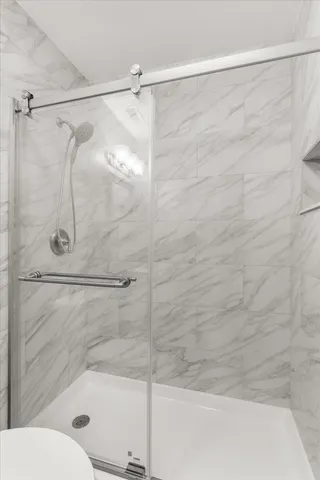 a view of a house with a street