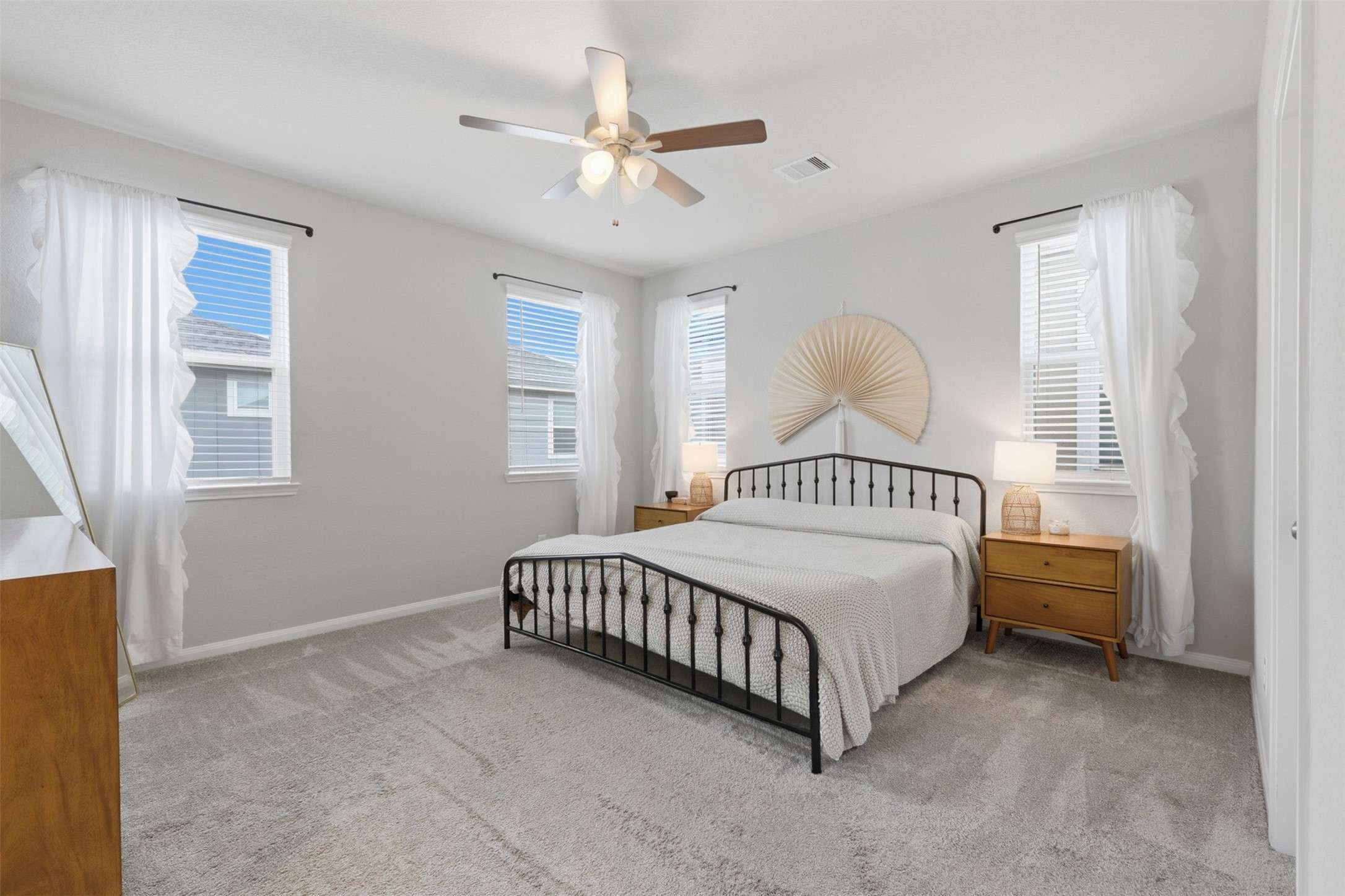 5415 Cuerta Street Houston, TX 77023 - Photo 14 of 25 a bedroom with a bed and a window