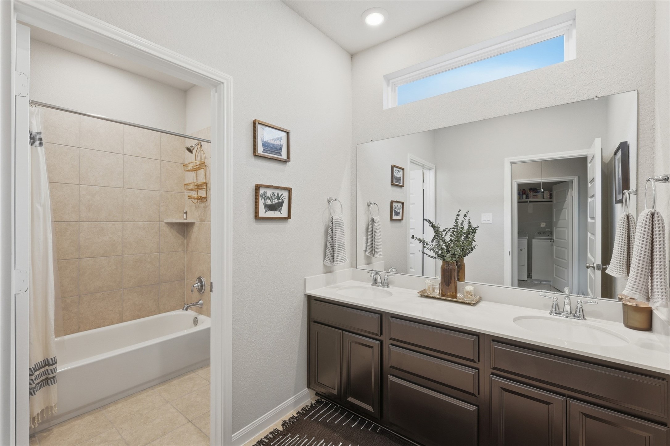 5415 Cuerta Street Houston, TX 77023 - Photo 18 of 25 a bathroom with a double vanity sink mirror double and shower