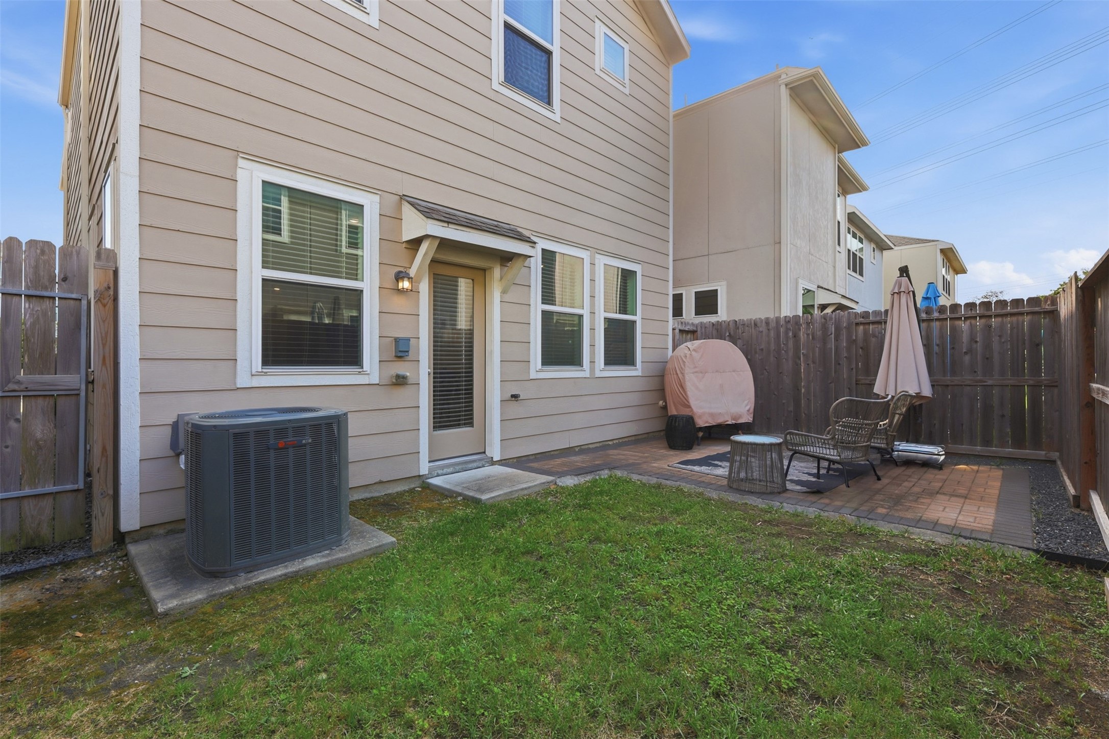 5415 Cuerta Street Houston, TX 77023 - Photo 22 of 25 a view of a house with backyard sitting area and garden
