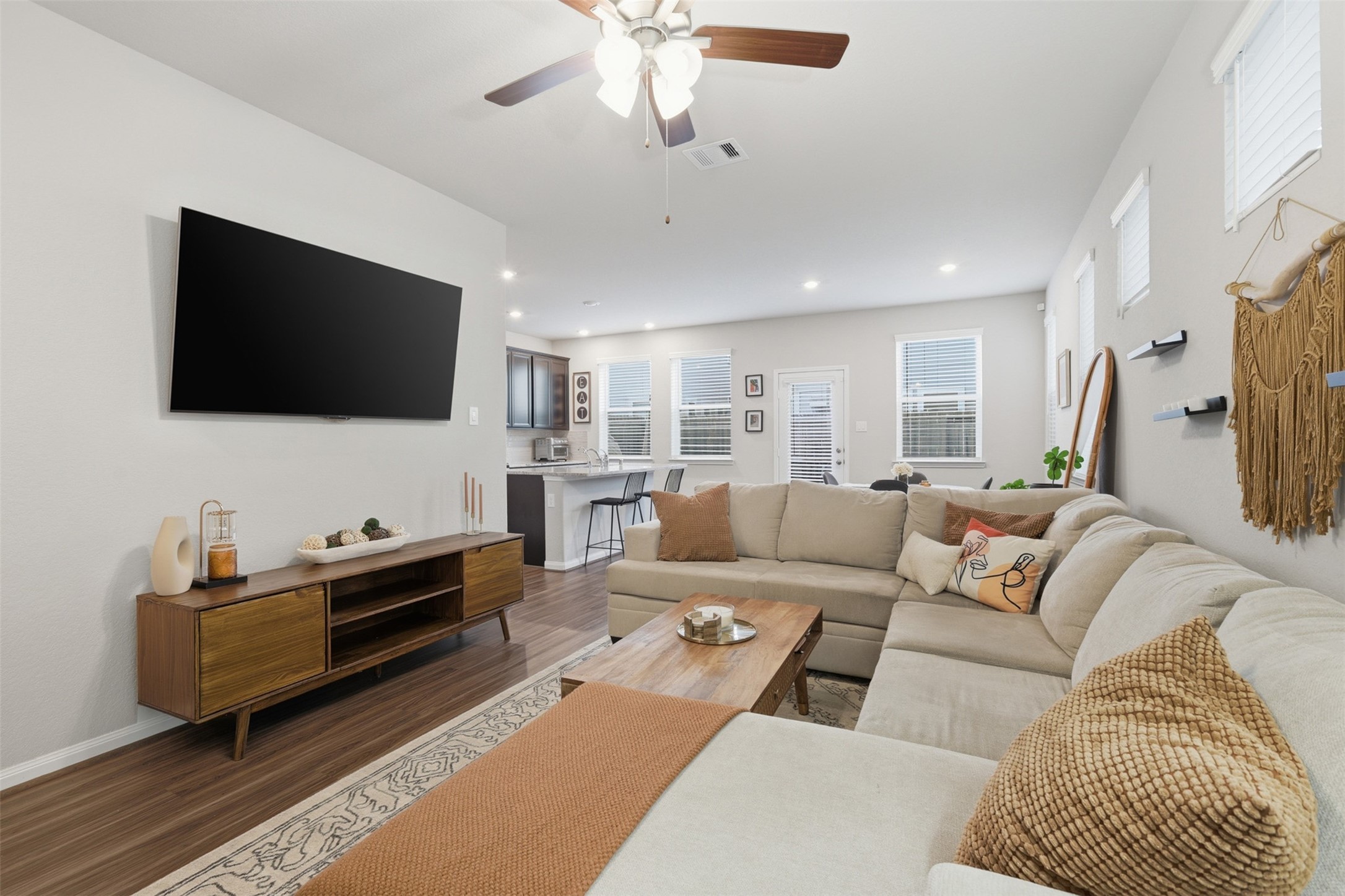 5415 Cuerta Street Houston, TX 77023 - Photo 4 of 25 a living room with furniture and a flat screen tv