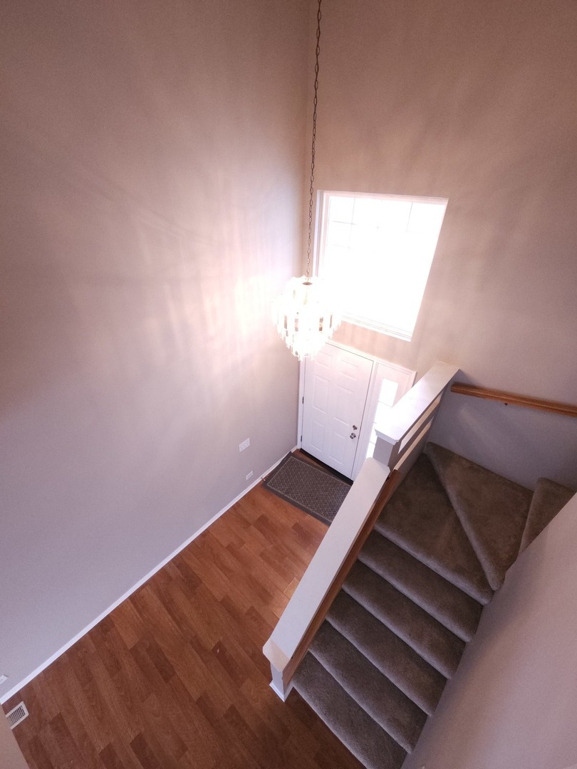 407 Spaulding Road, Unit 407 Bartlett, IL 60103 - Photo 2 of 18 a view of entryway