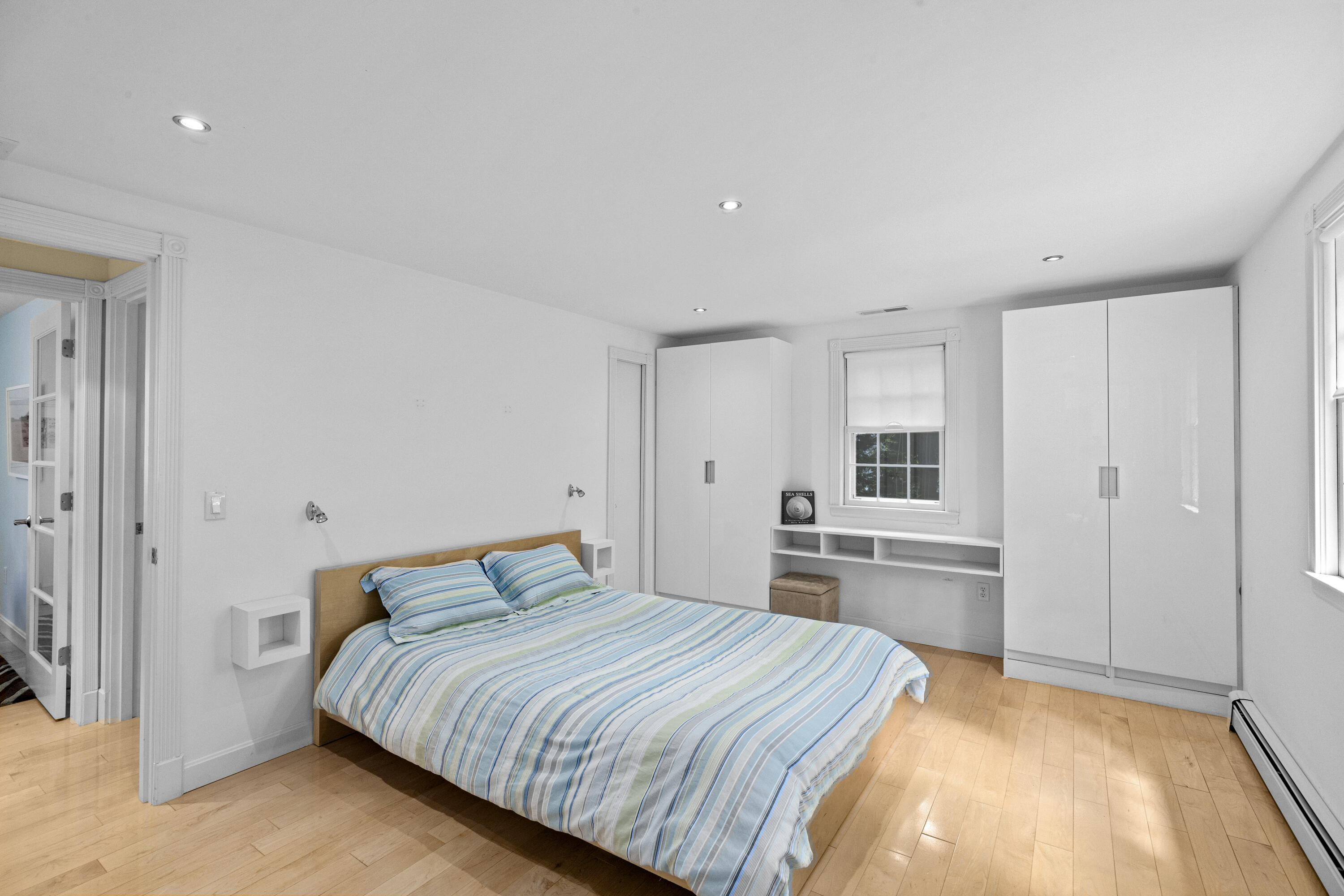 119 Cottonwood Road Harwich, MA 02645 - Photo 12 of 30 a bedroom with a large bed and a couch