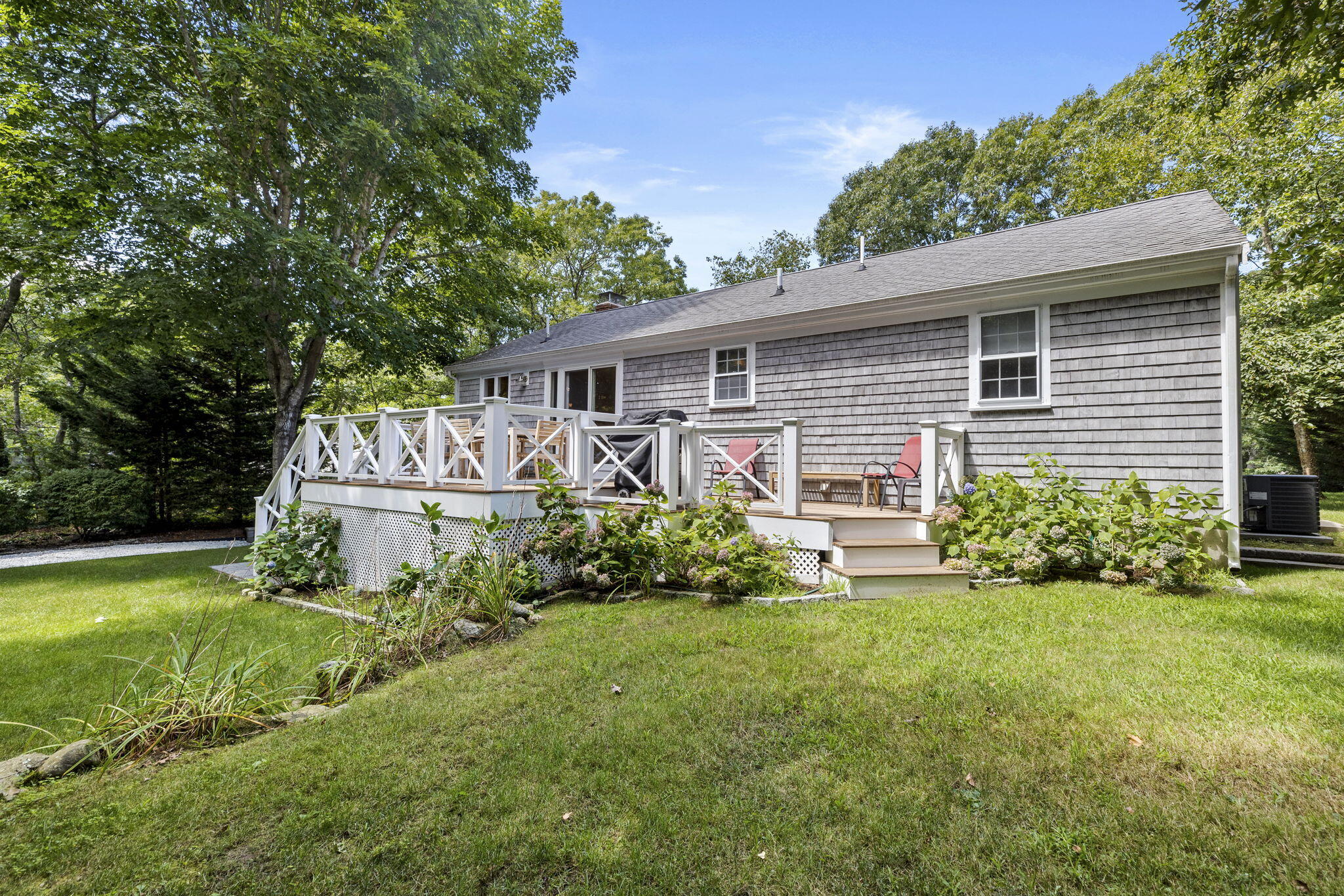 119 Cottonwood Road Harwich, MA 02645 - Photo 24 of 30 a front view of house with yard and green space