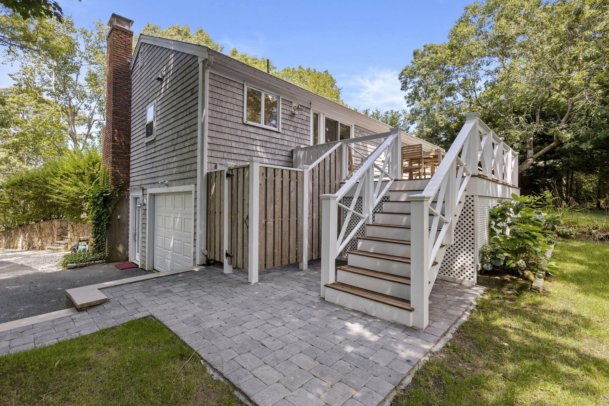 119 Cottonwood Road Harwich, MA 02645 - Photo 26 of 30 a view of a house with a yard and stairs