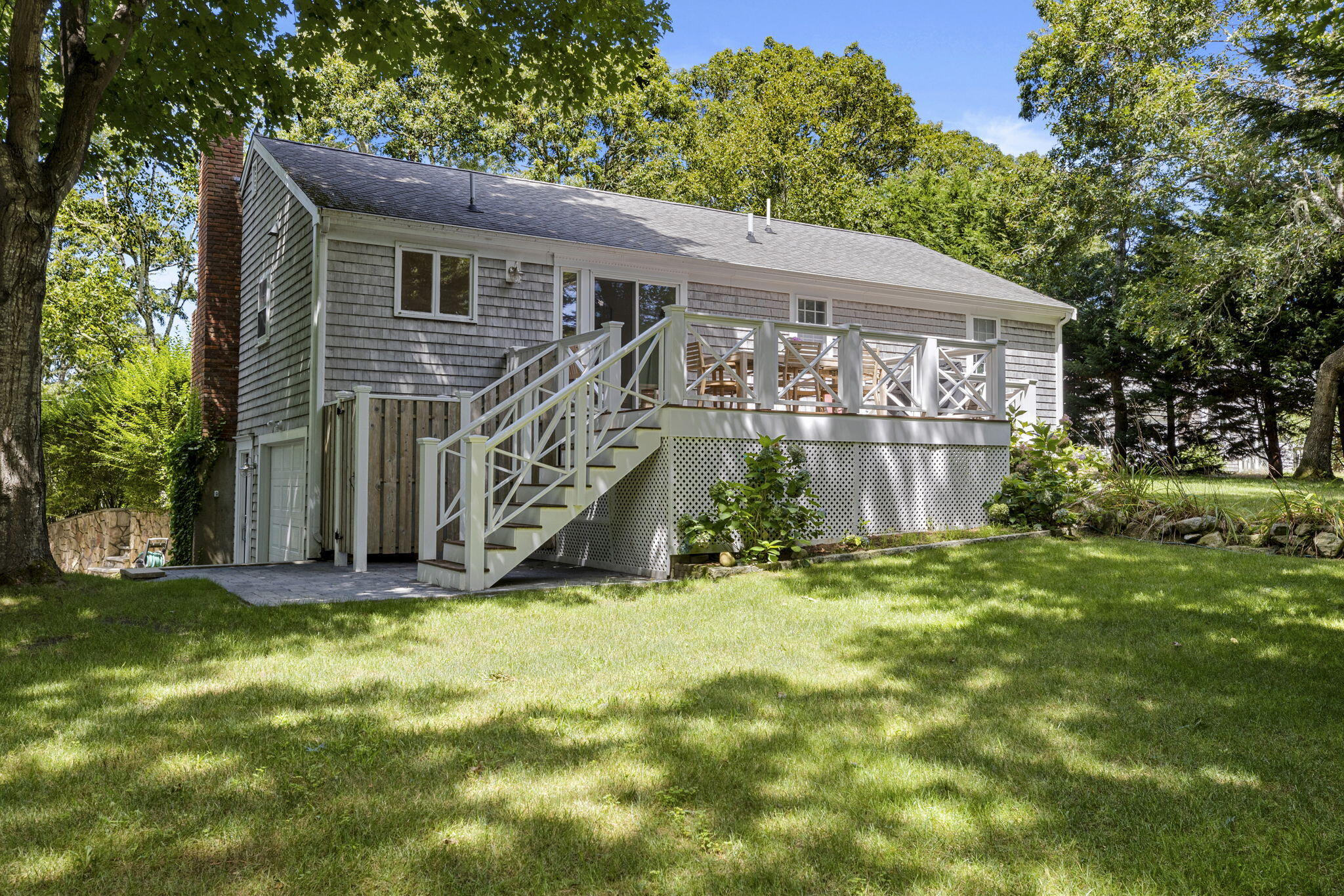119 Cottonwood Road Harwich, MA 02645 - Photo 28 of 30 a view of a house with a yard