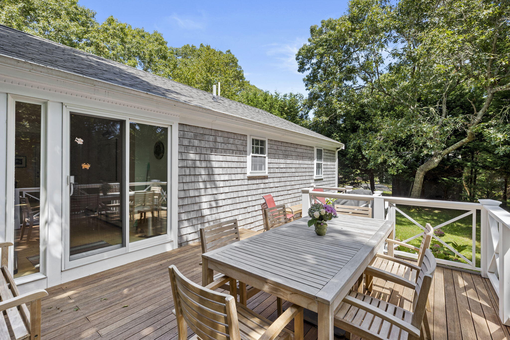 119 Cottonwood Road Harwich, MA 02645 - Photo 29 of 30 a view of sitting area with furniture on wooden deck