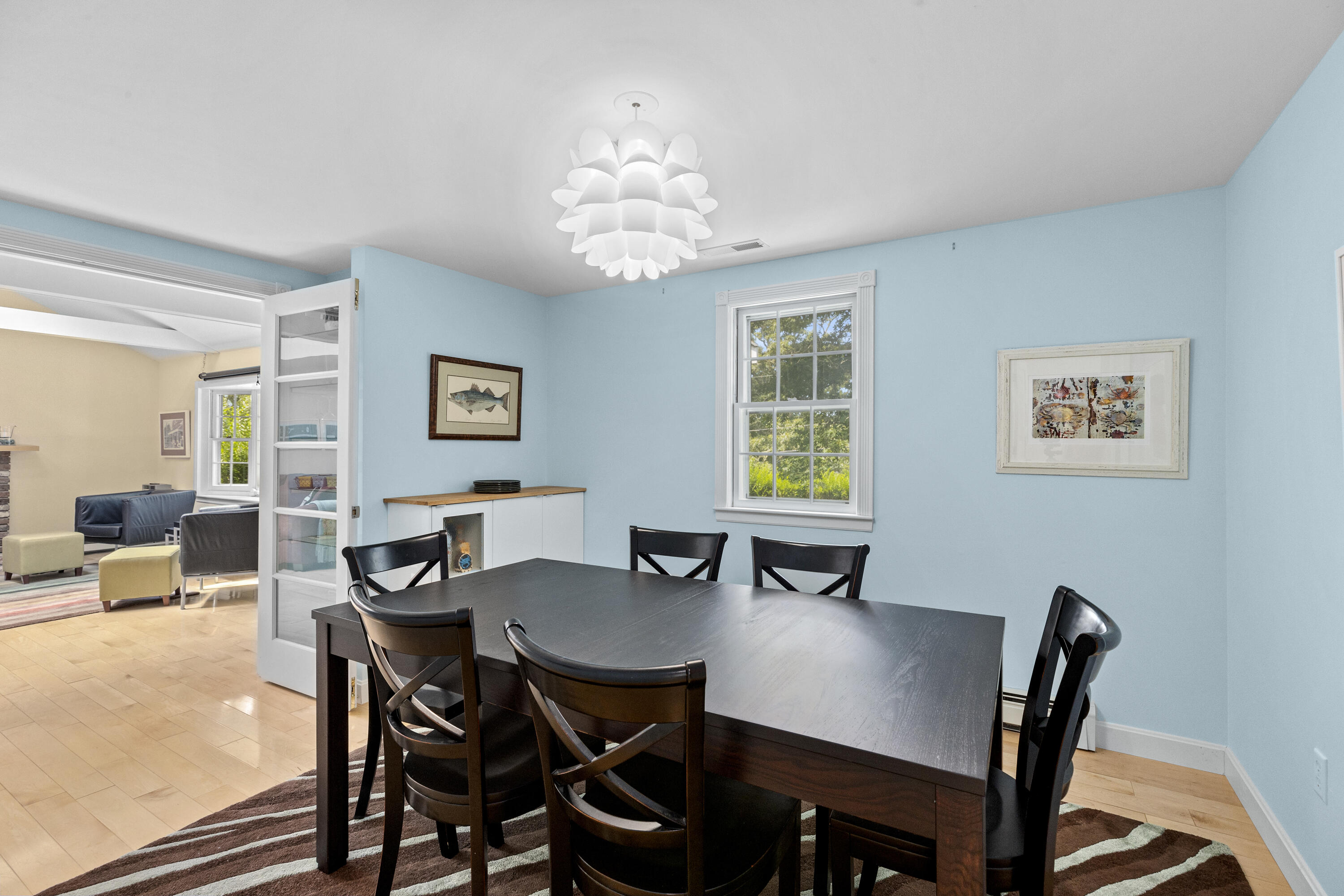 119 Cottonwood Road Harwich, MA 02645 - Photo 5 of 30 a view of a dining room with furniture and wooden floor