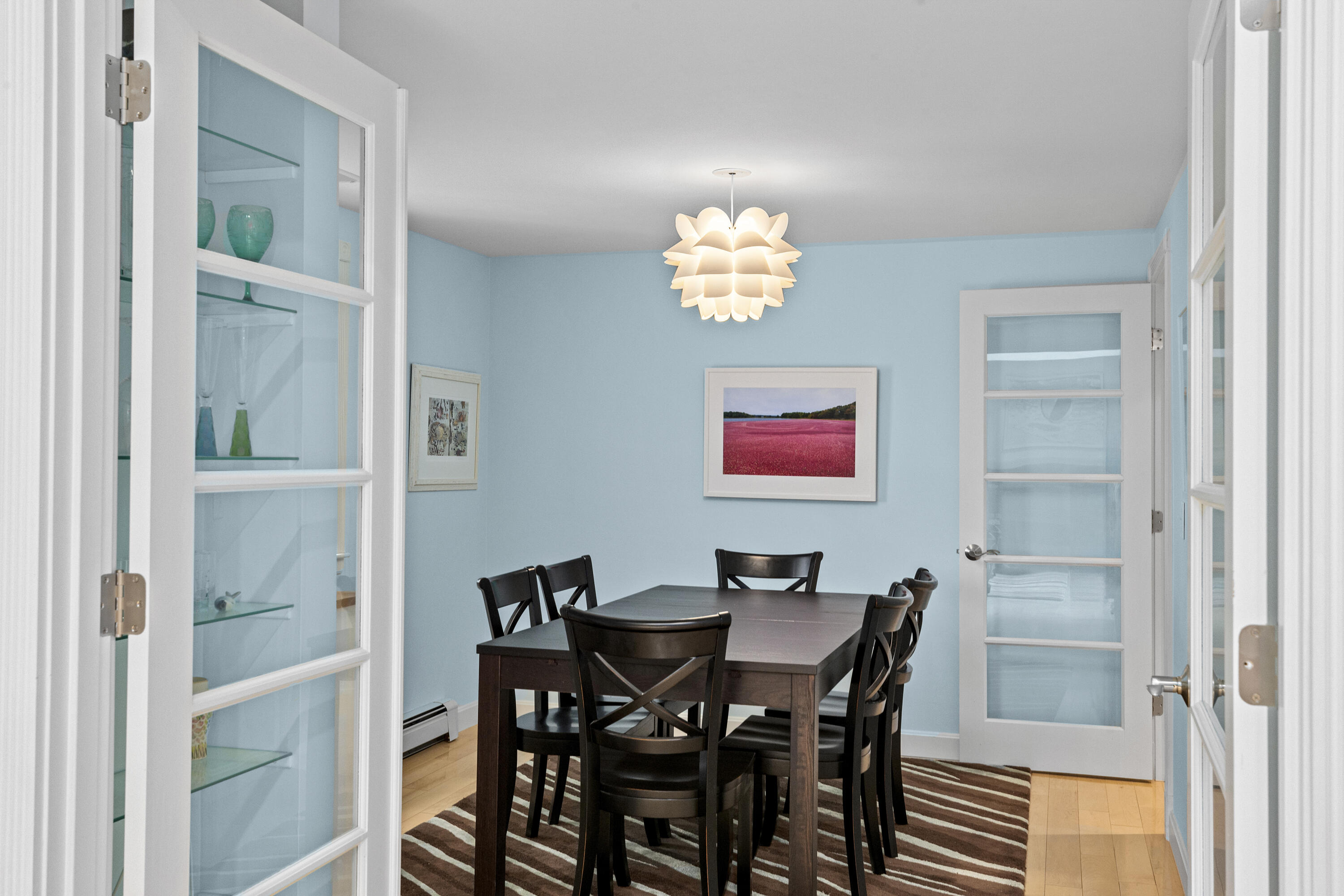 119 Cottonwood Road Harwich, MA 02645 - Photo 6 of 30 a view of a dining room with furniture and chandelier