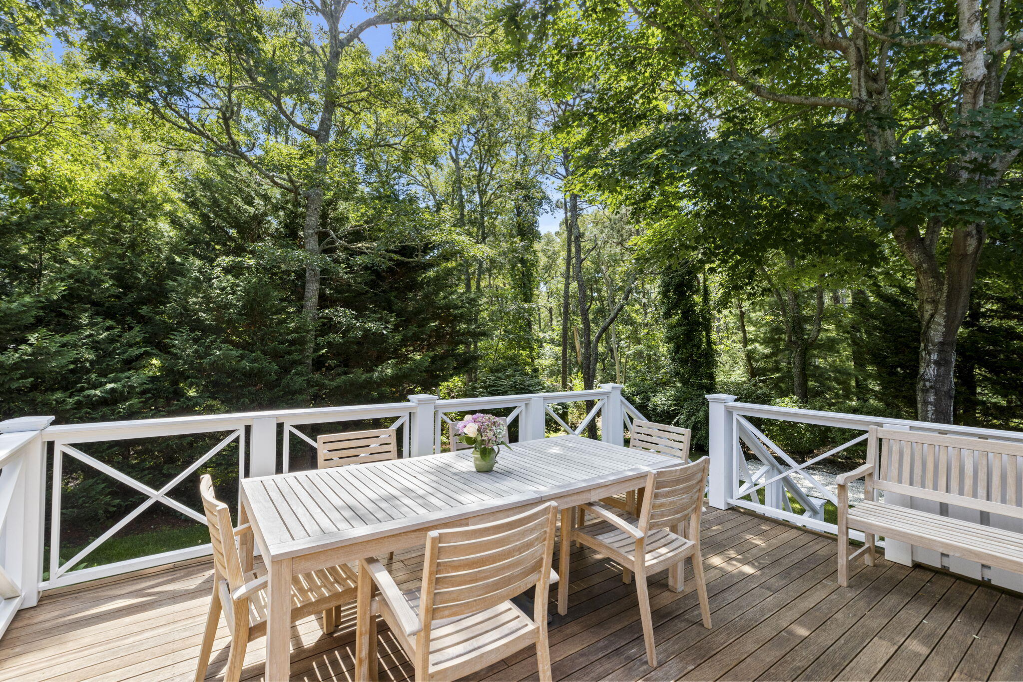 119 Cottonwood Road Harwich, MA 02645 - Photo 10 of 30 a view of a dinning table and chairs on the roof deck
