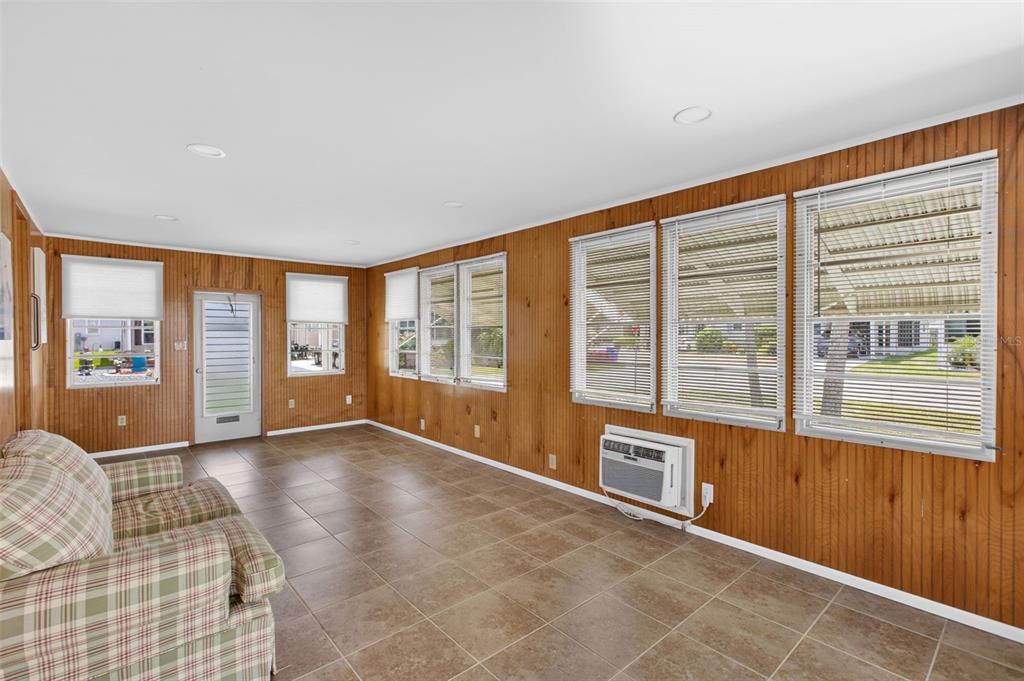 802 Turf Street Venice, FL 34285 - Photo 17 of 50 a view of an empty room with a window