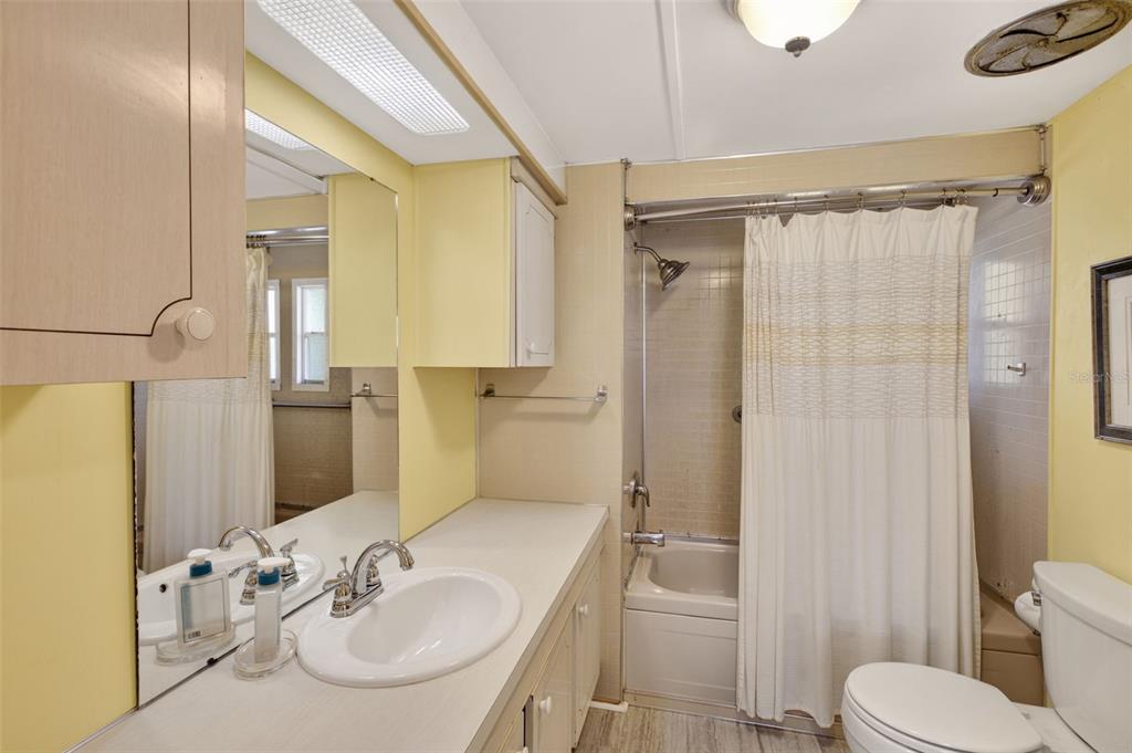802 Turf Street Venice, FL 34285 - Photo 26 of 50 a bathroom with a sink toilet and shower
