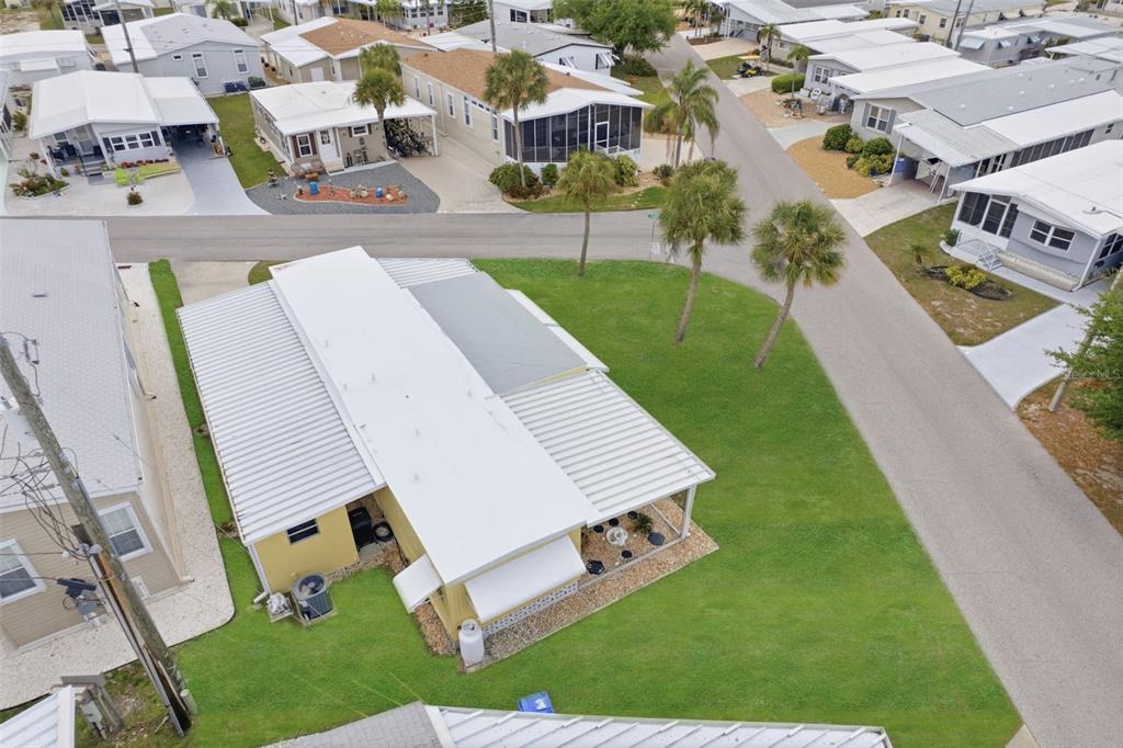 802 Turf Street Venice, FL 34285 - Photo 33 of 50 an aerial view of a house with swimming pool garden and patio