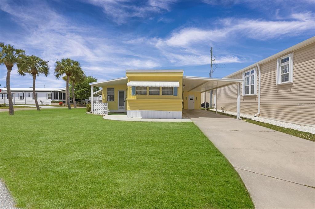 802 Turf Street Venice, FL 34285 - Photo 34 of 50 a view of a house with a backyard
