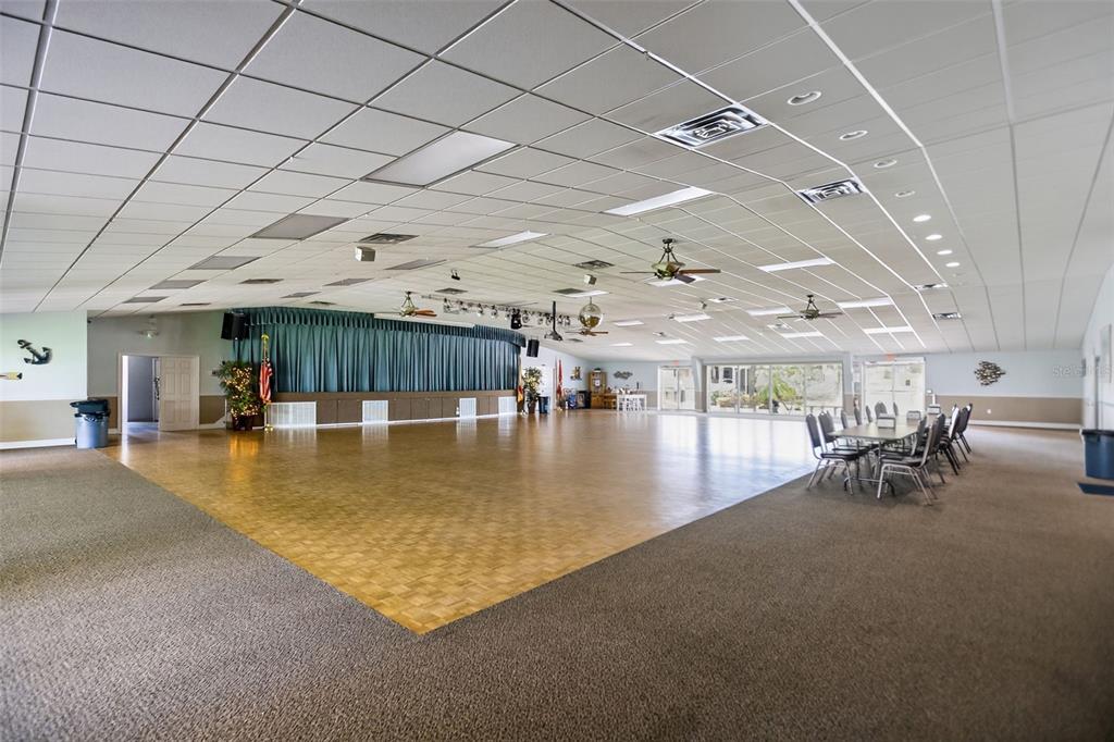 802 Turf Street Venice, FL 34285 - Photo 46 of 50 a view of a room with lots of dining table and chairs