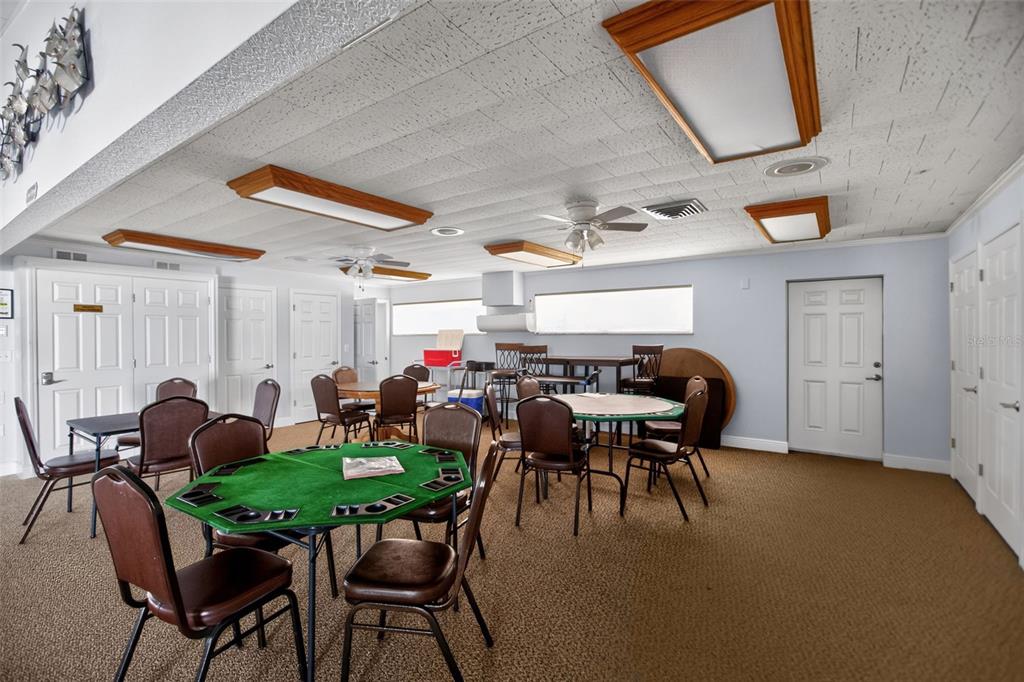 802 Turf Street Venice, FL 34285 - Photo 49 of 50 a dining room with furniture and a window