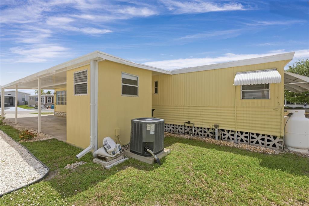 802 Turf Street Venice, FL 34285 - Photo 7 of 50 a front view of a house with a yard