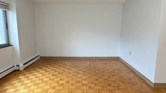 a view of a room with an empty room