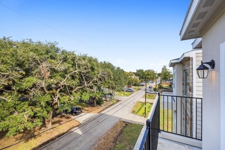 6818 St Augustine Street Houston, TX 77021 - Photo 4 of 4 a view of a balcony with wooden floor and fence
