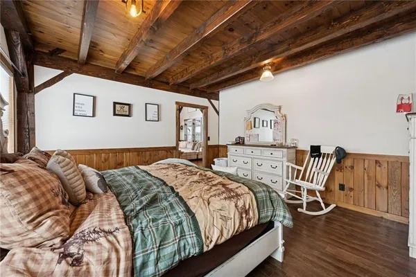 a bathroom with a tub a sink and a shower