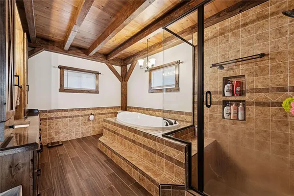 a bathroom with a double vanity sink and mirror