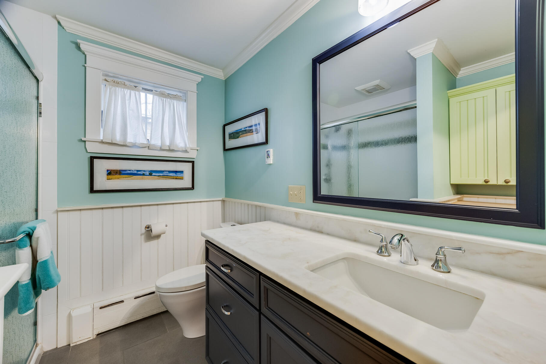 117 Gardiner Road Woods Hole, MA 02543 - Photo 20 of 81 a bathroom with a granite countertop toilet sink and mirror