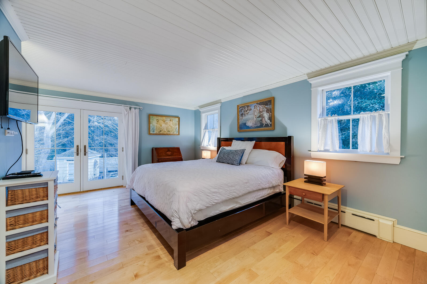 117 Gardiner Road Woods Hole, MA 02543 - Photo 24 of 81 a bedroom with a bed and wooden floor