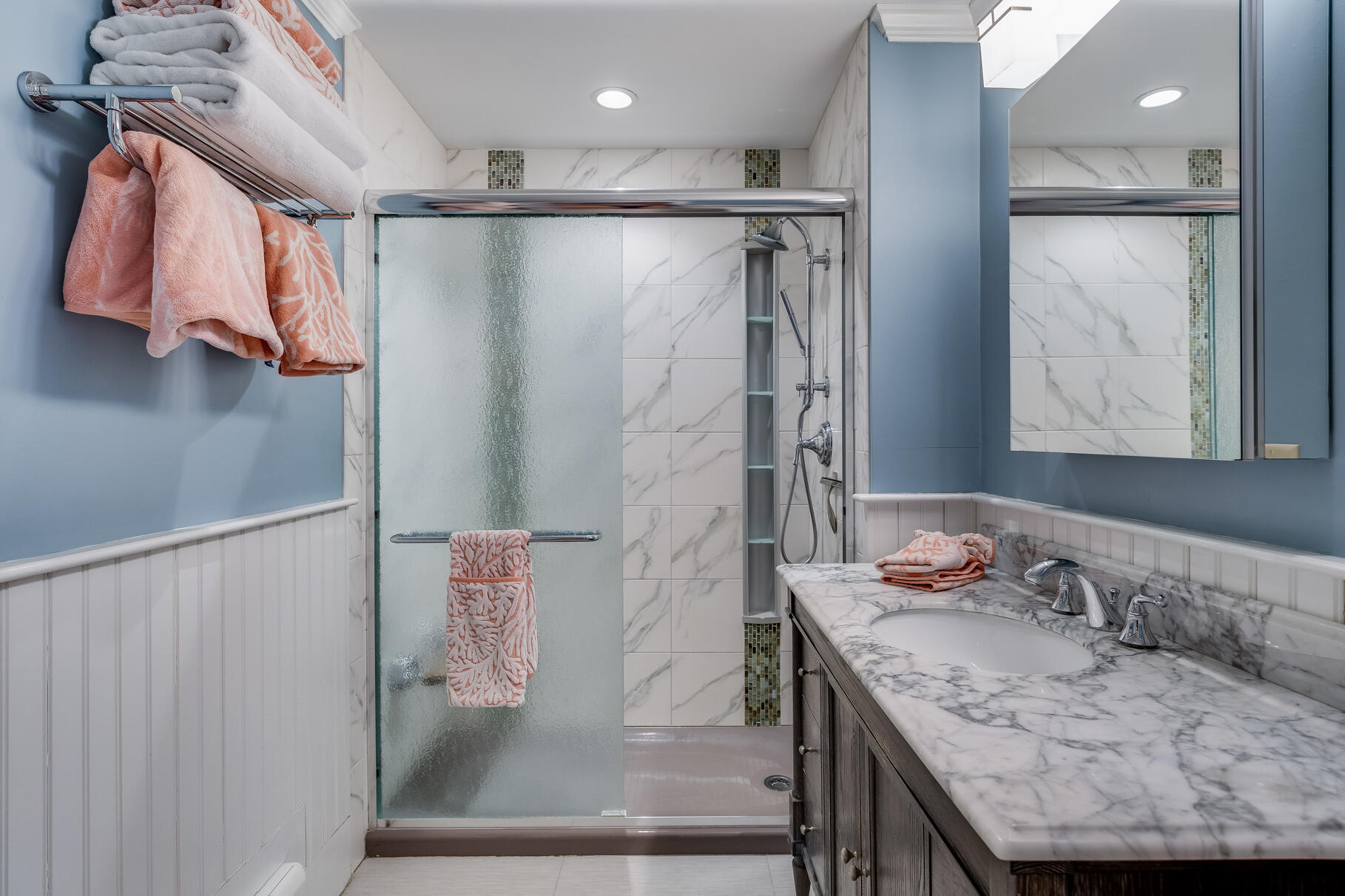 117 Gardiner Road Woods Hole, MA 02543 - Photo 30 of 81 a bathroom with a granite countertop sink a mirror and shower