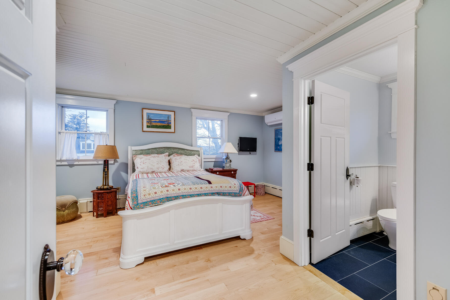 117 Gardiner Road Woods Hole, MA 02543 - Photo 33 of 81 a spacious bedroom with a bed and a window