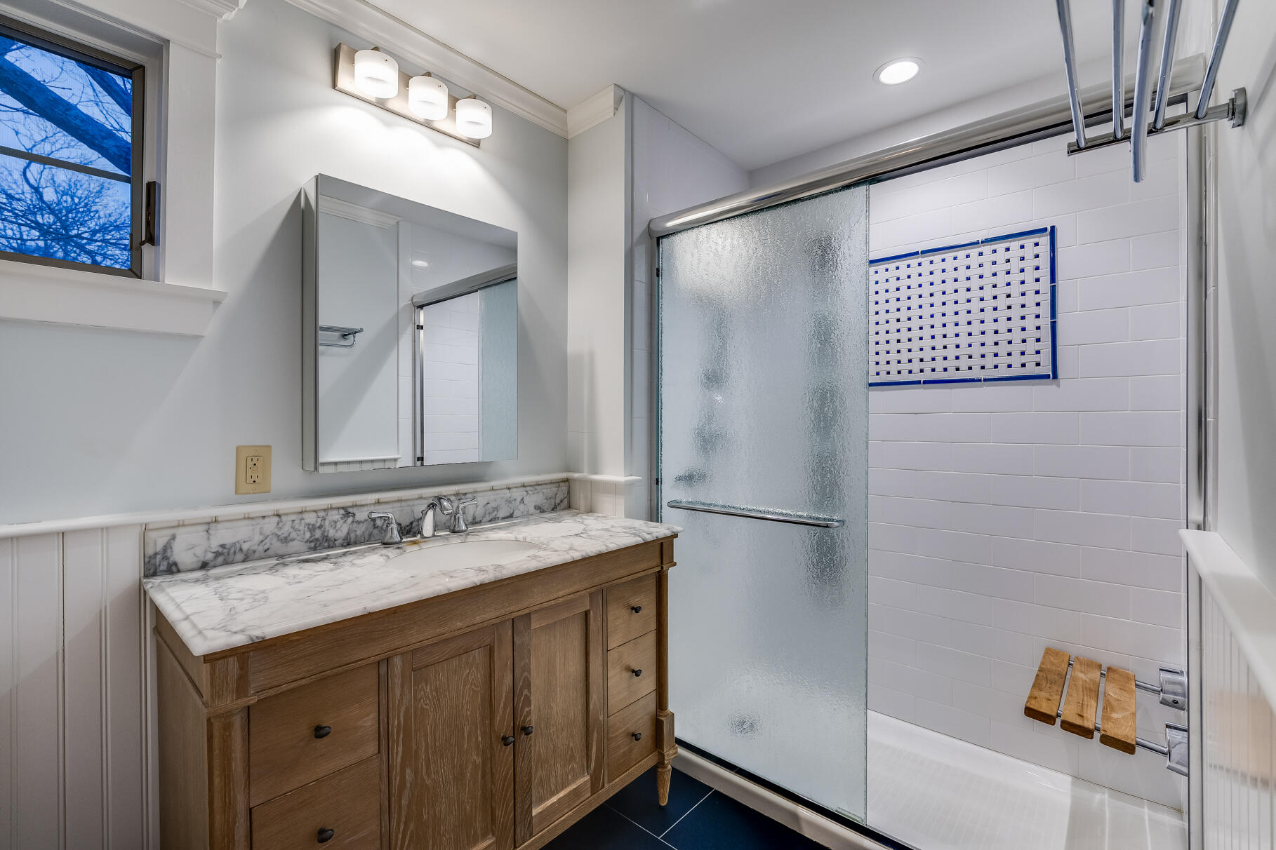 117 Gardiner Road Woods Hole, MA 02543 - Photo 37 of 81 a bathroom with a sink a mirror and a shower