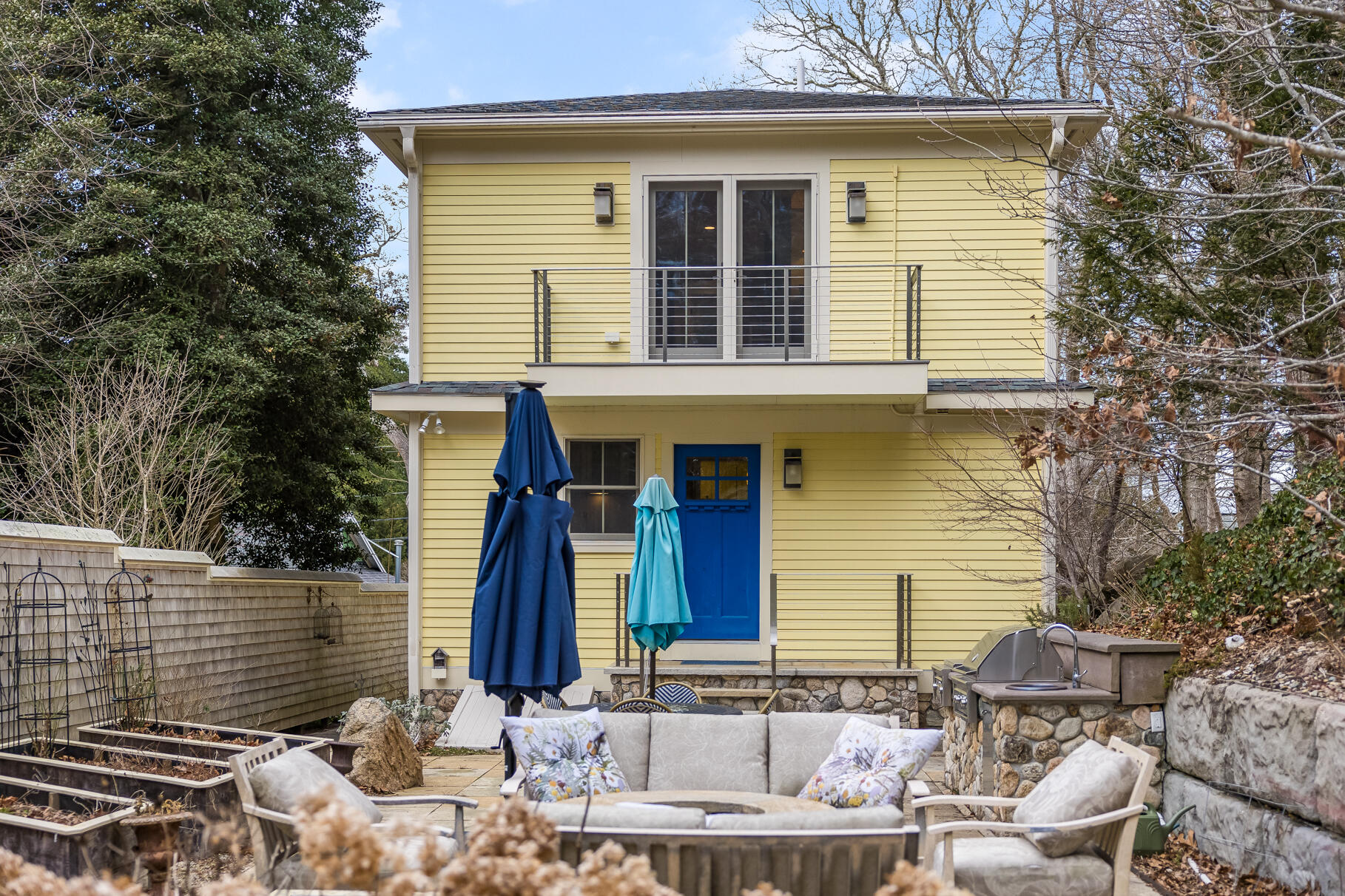 117 Gardiner Road Woods Hole, MA 02543 - Photo 53 of 81 a front view of a house with garden