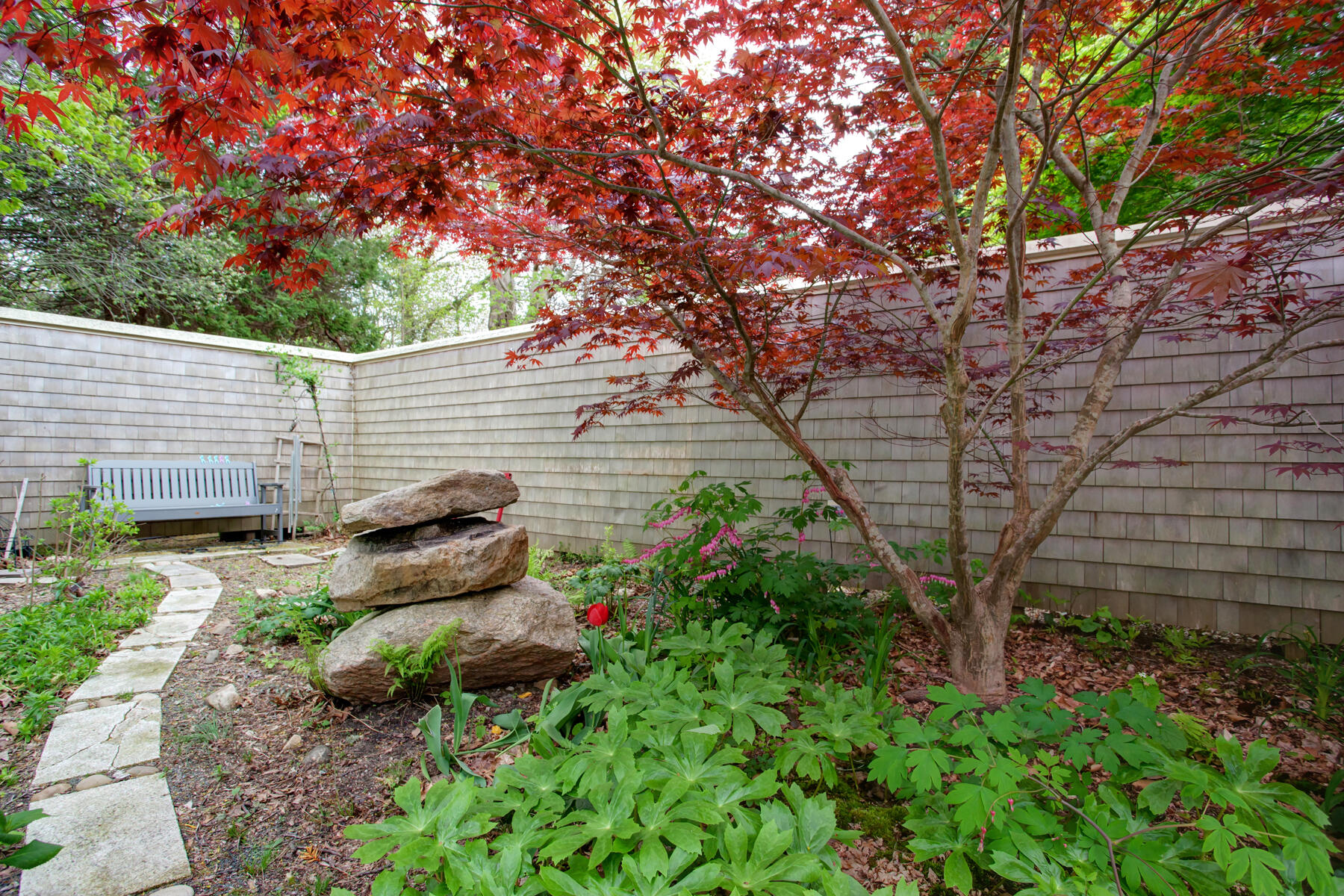 117 Gardiner Road Woods Hole, MA 02543 - Photo 65 of 81 a backyard of a house with lots of green space