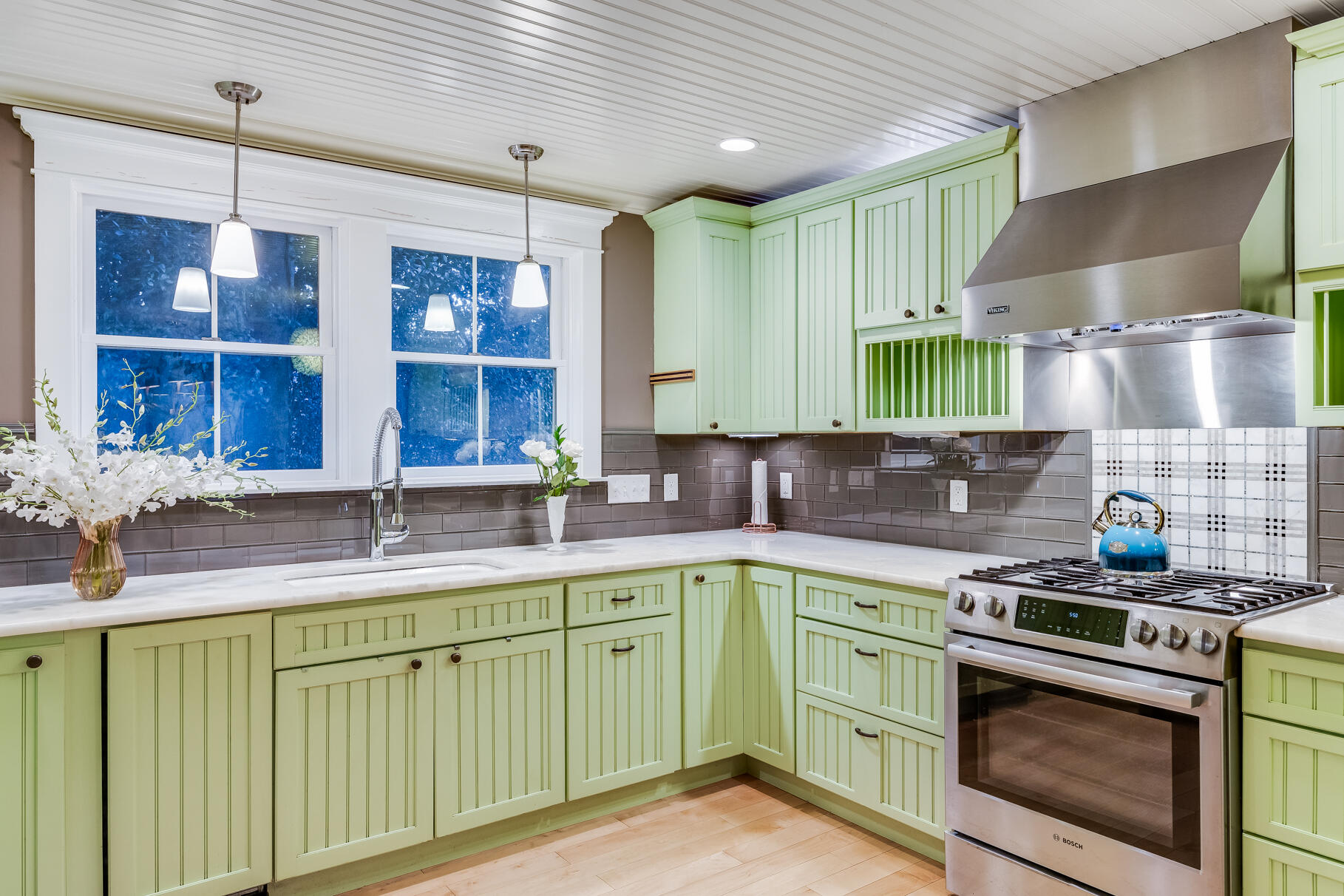 117 Gardiner Road Woods Hole, MA 02543 - Photo 67 of 81 a kitchen with a sink a stove and cabinets