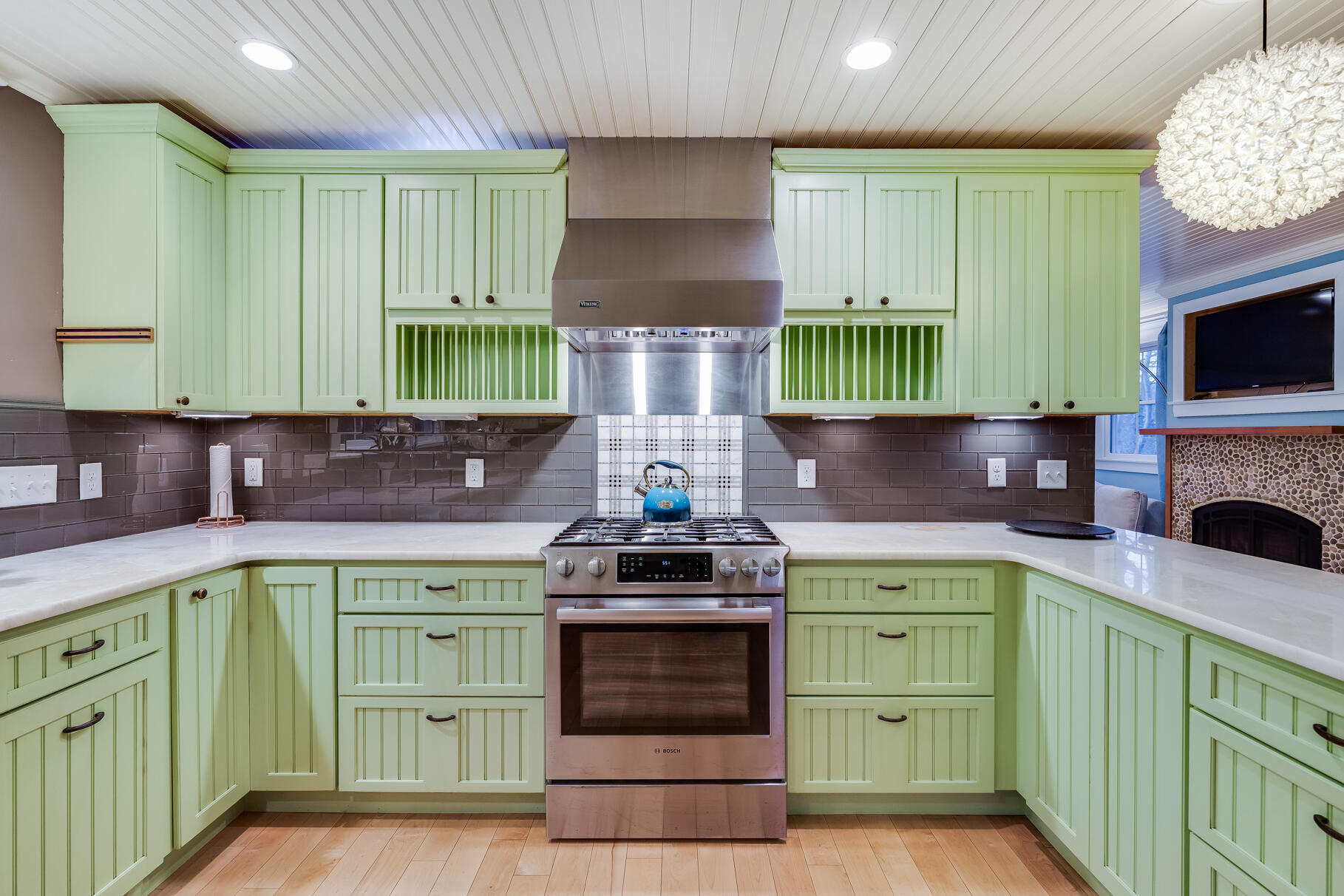 117 Gardiner Road Woods Hole, MA 02543 - Photo 68 of 81 a kitchen with stainless steel appliances granite countertop a stove a sink and a microwave