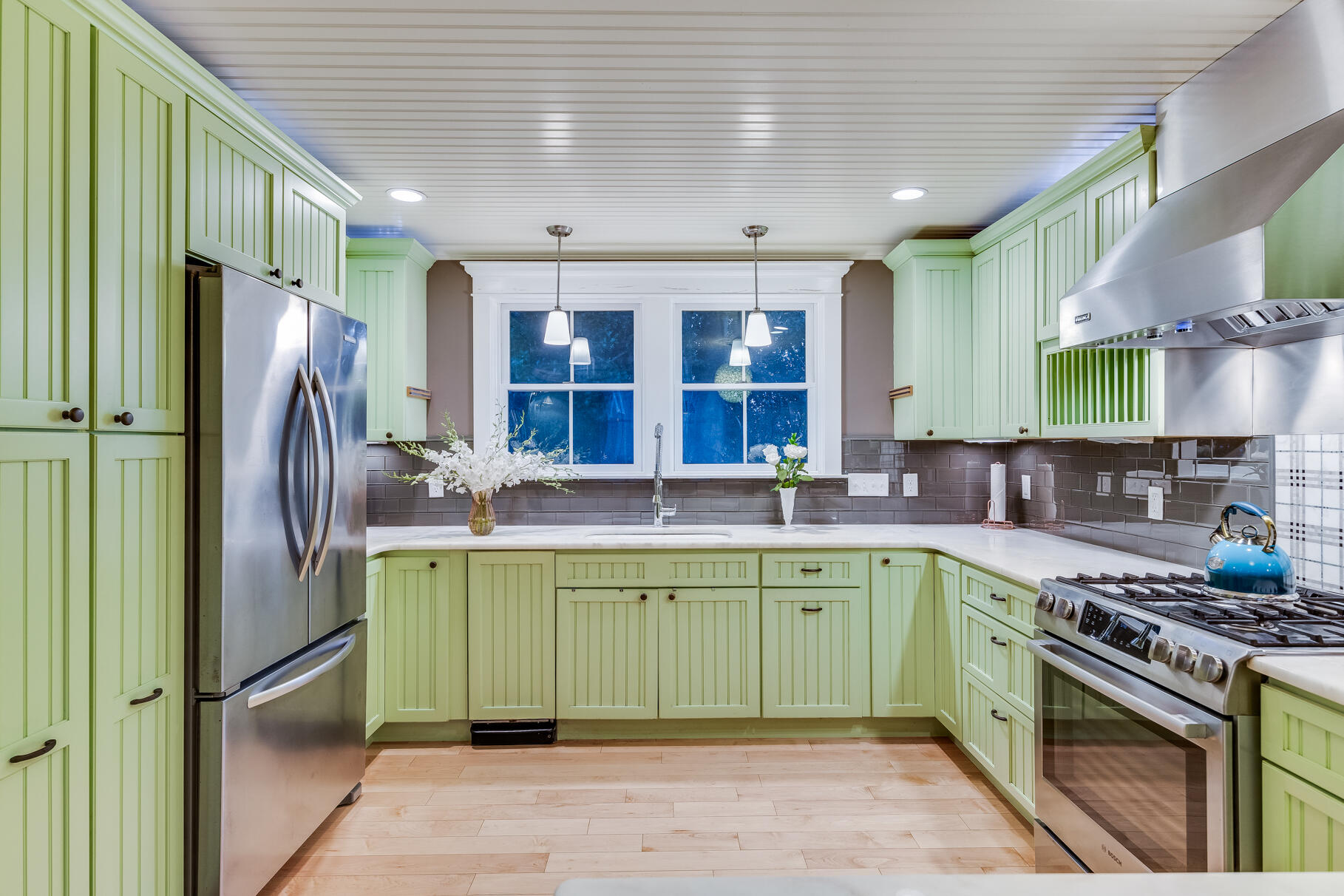 117 Gardiner Road Woods Hole, MA 02543 - Photo 69 of 81 a kitchen with stainless steel appliances granite countertop a sink a stove and refrigerator