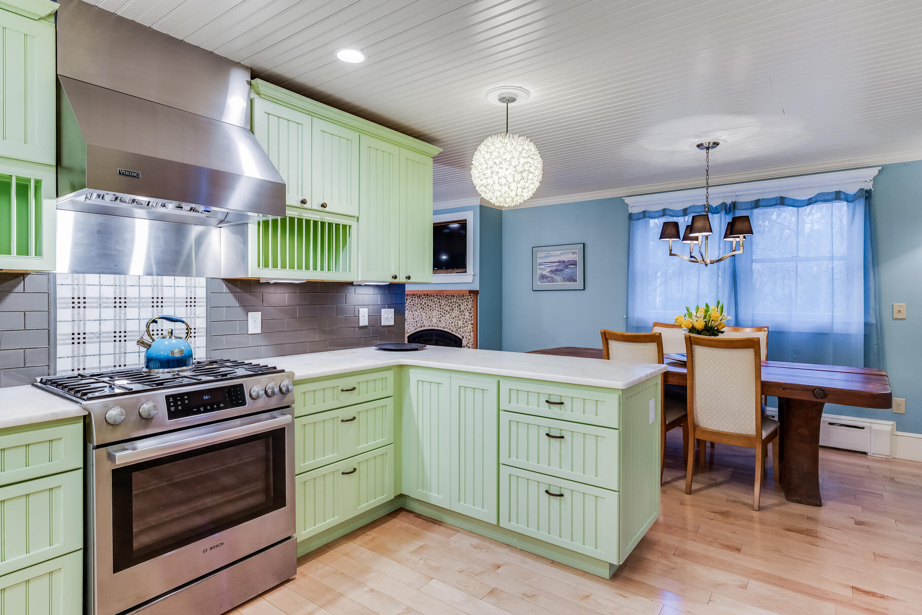 117 Gardiner Road Woods Hole, MA 02543 - Photo 10 of 81 a kitchen with a table and chairs in it