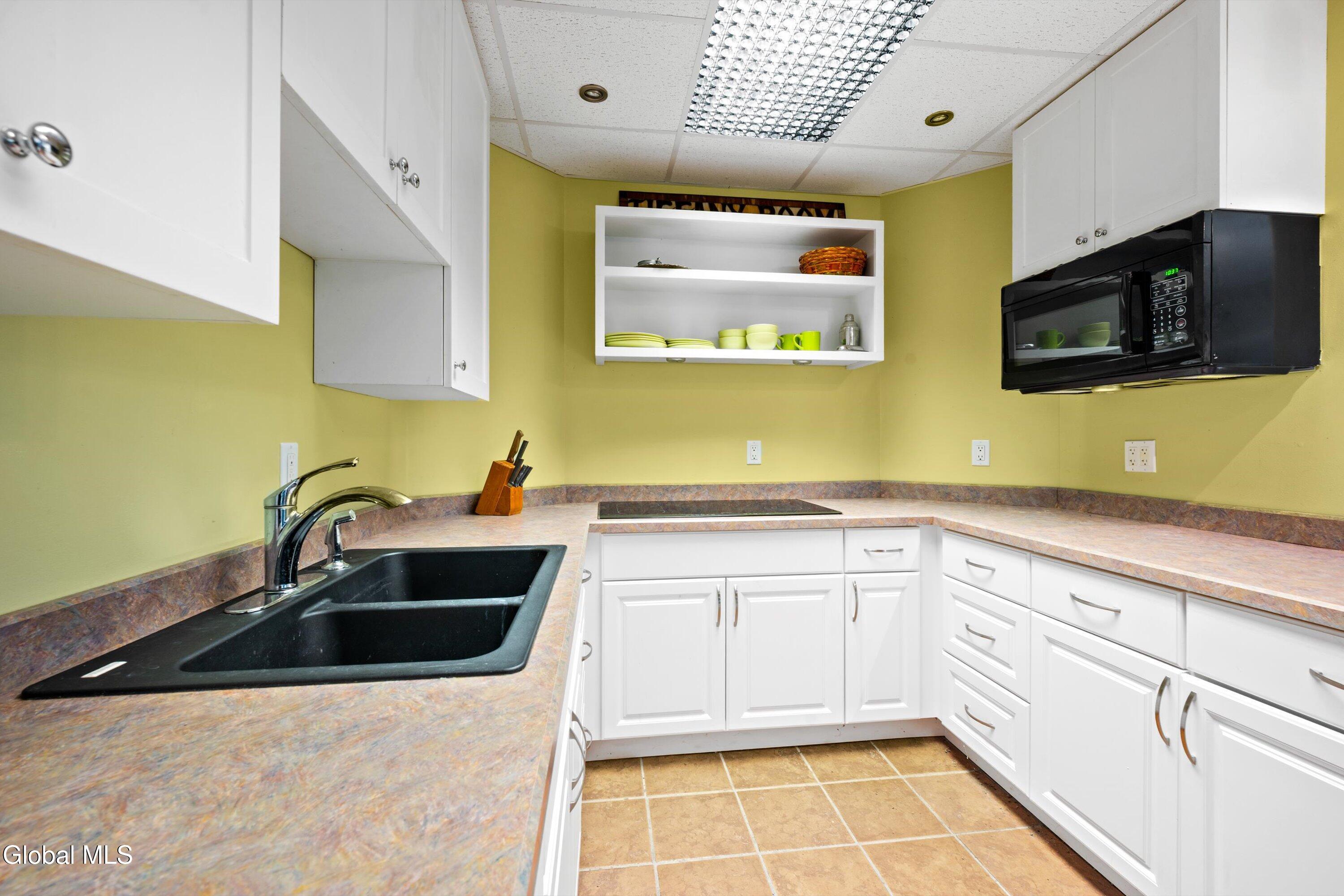 85 Harris Road Northumberland, NY 12871 - Photo 33 of 46 Basement kitchen