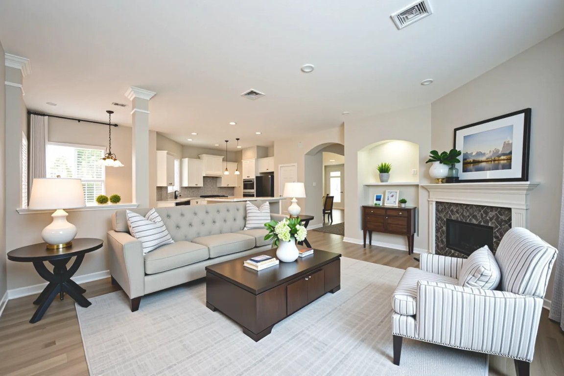 1502 Beaconshire Houston, TX 77077 - Photo 11 of 29 a living room with furniture and a fireplace