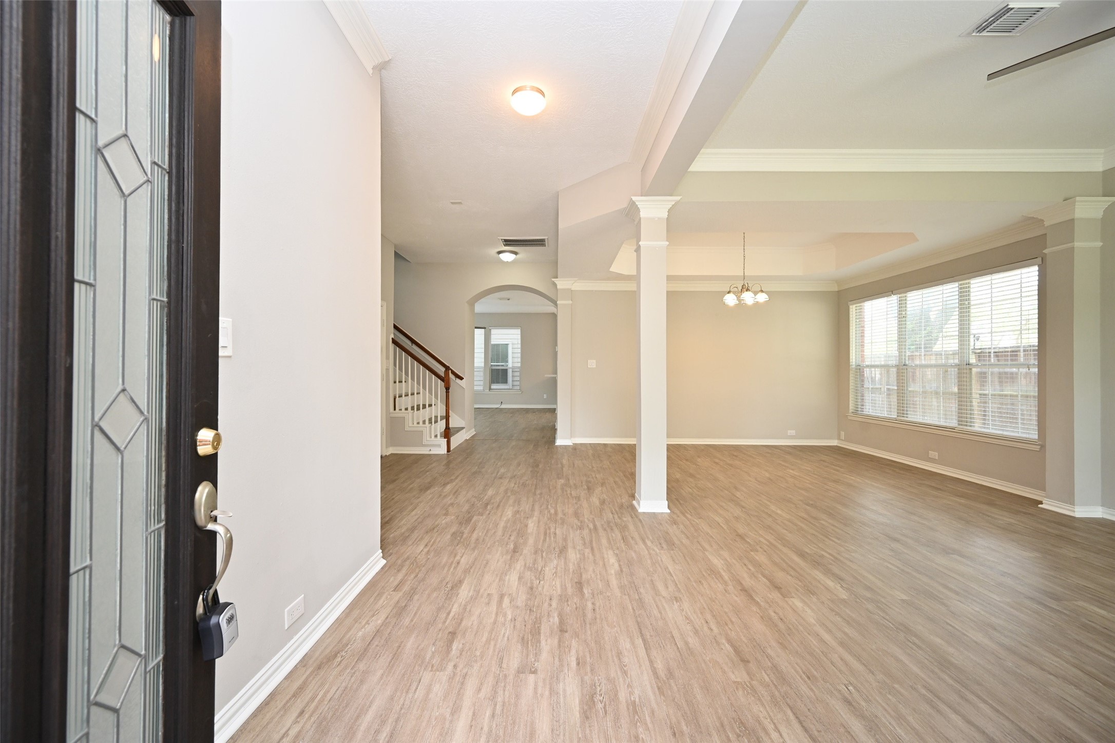 1502 Beaconshire Houston, TX 77077 - Photo 3 of 29 a view of a room with wooden floor and a window